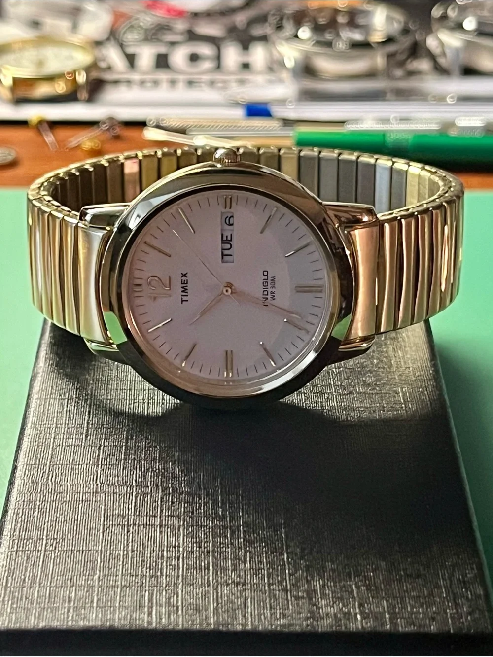 Timex Gold Tone Watch with White Dial and Day-Date